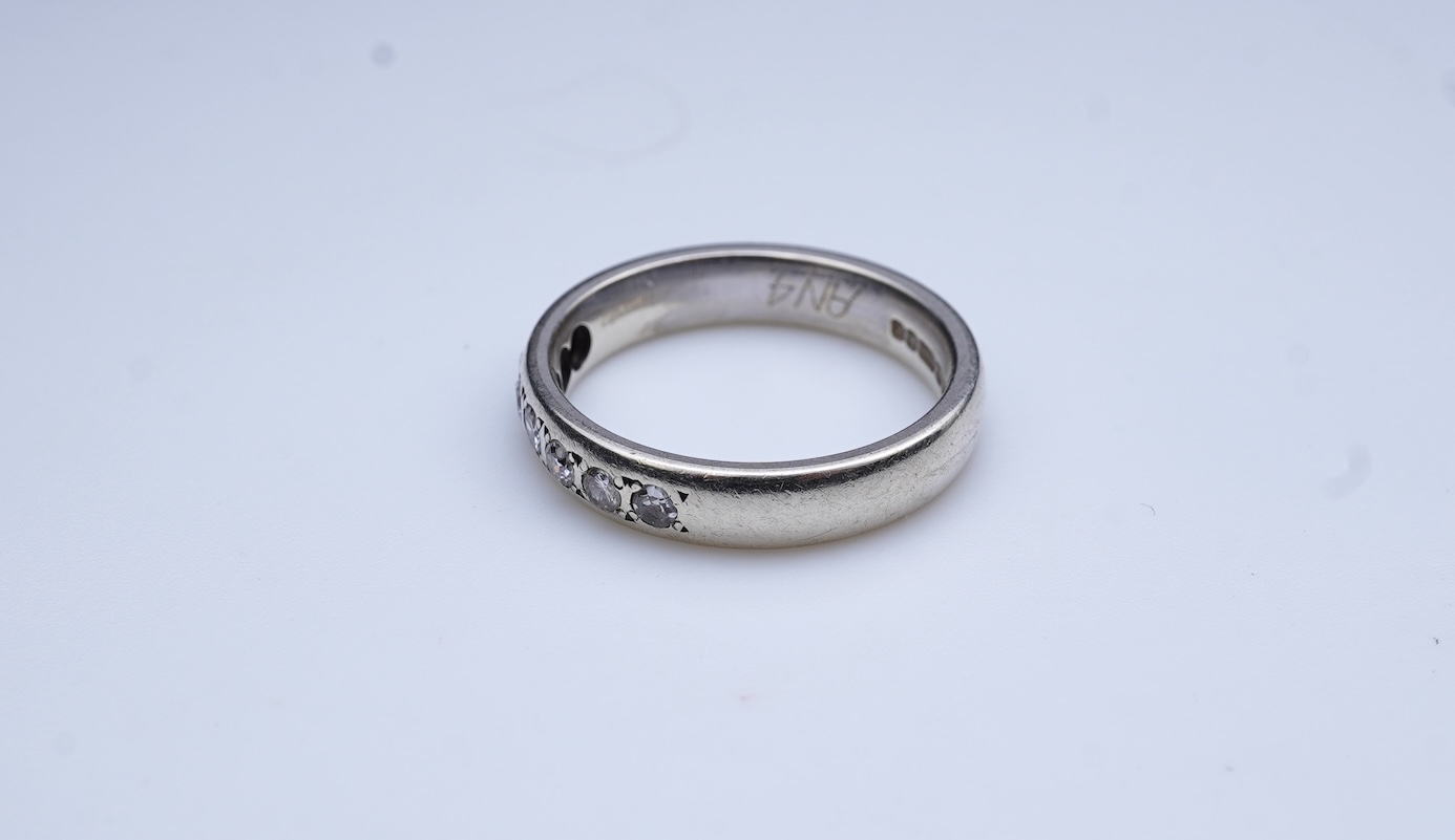 A diamond ring and two gold wedding rings
